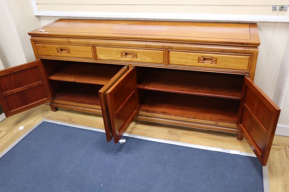 A Chinese hardwood sideboard, width 182cm, depth 48cm, height 82cm